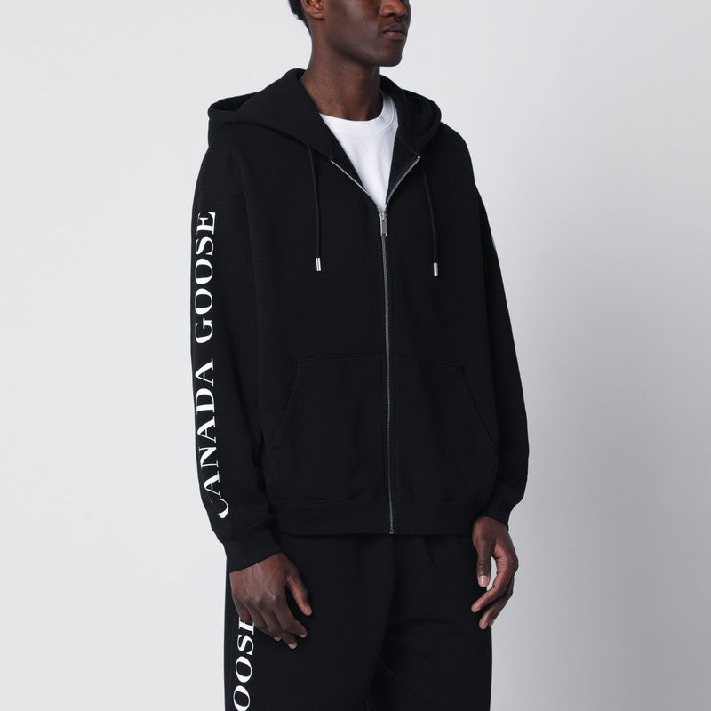 Black zip-up sweatshirt with logo