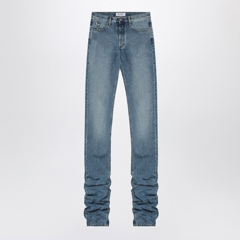 Sky Blue Jeans With Long Leg Curled At The Hem