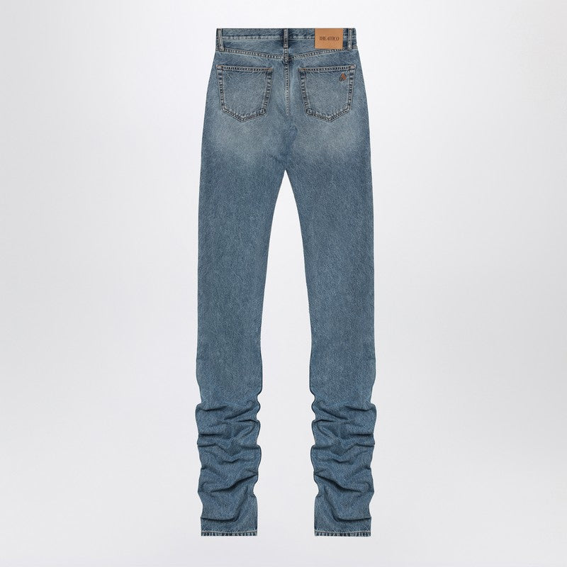 Sky Blue Jeans With Long Leg Curled At The Hem