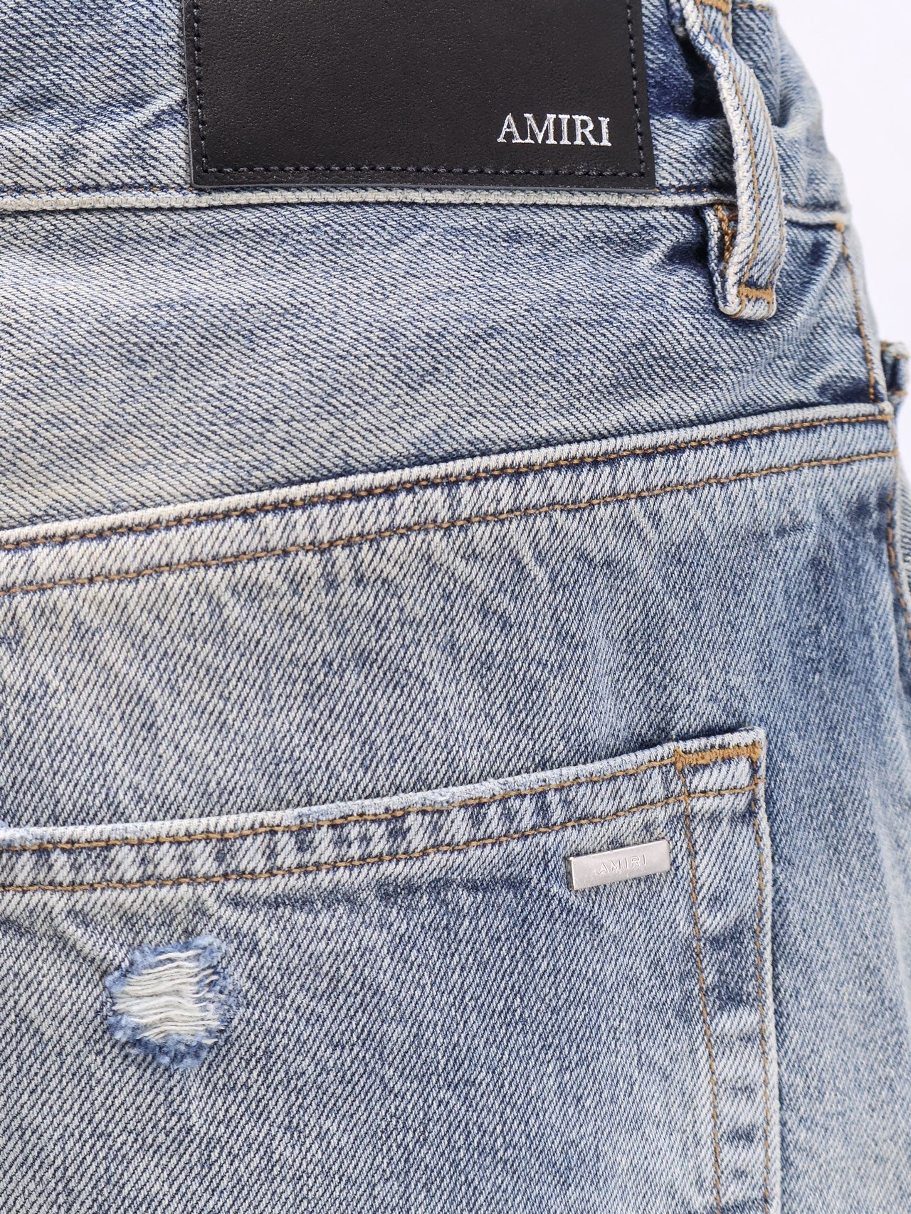 amiri-destroyed-effect-jeans