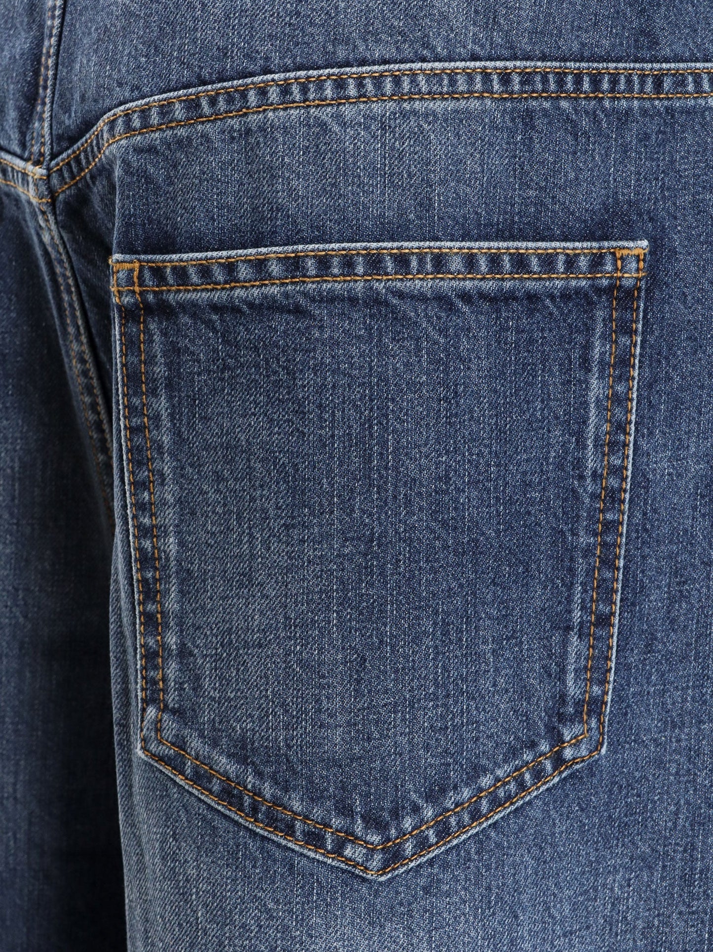 givenchy-twisted-re-washed-denim-jeans
