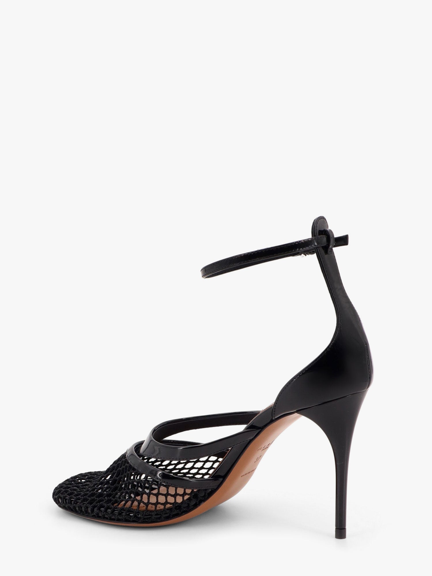 alaia-thong-sandals-in-fishnet-and-patent-leather
