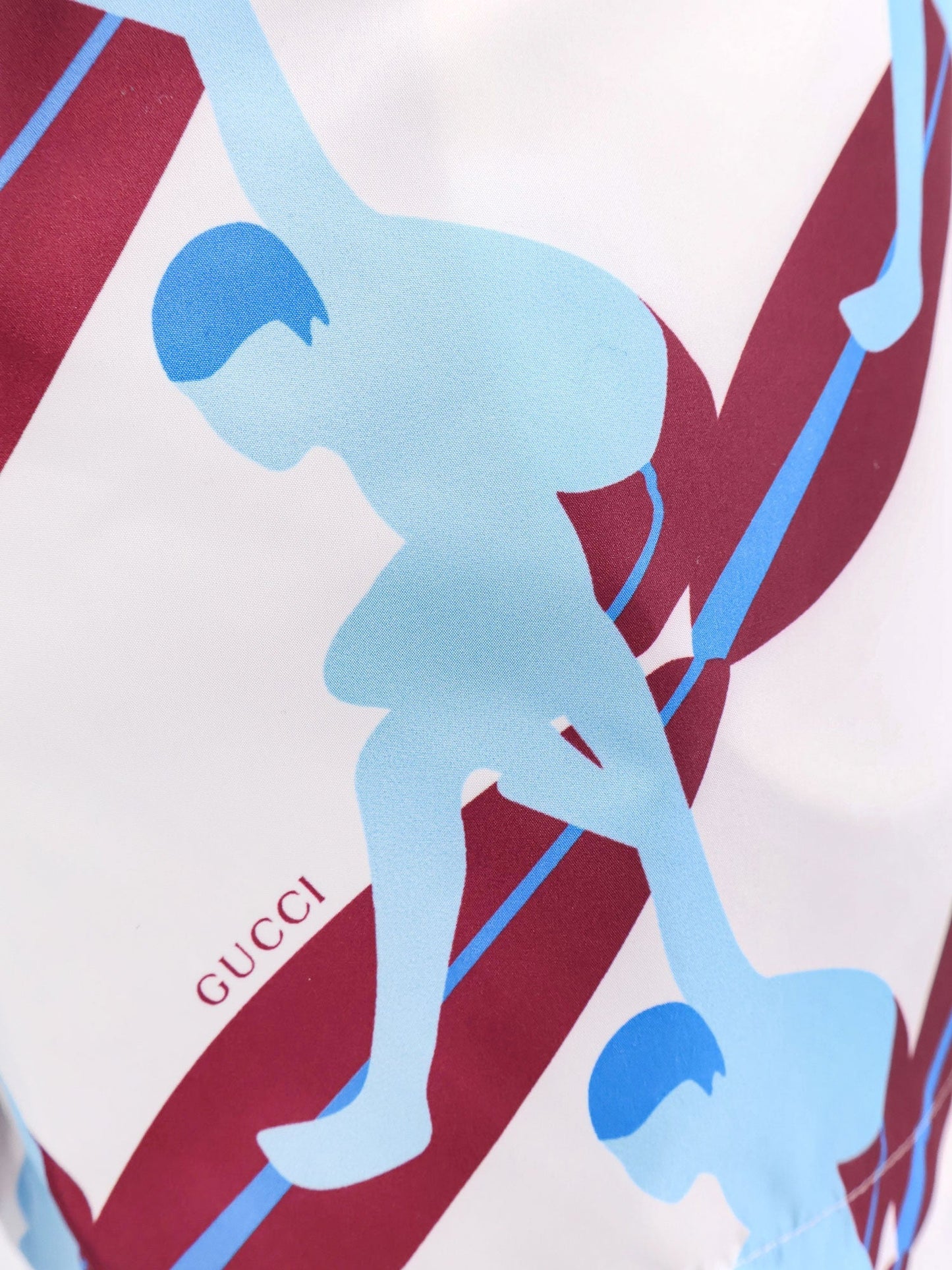 gucci-nylon-swim-trunk-with-surfer-print