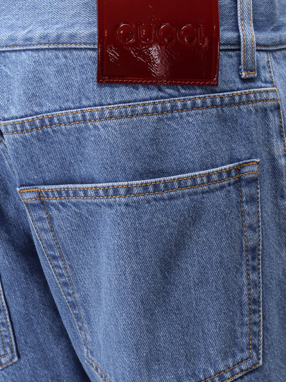 gucci-jeans-with-cuff-and-gucci-web-detail