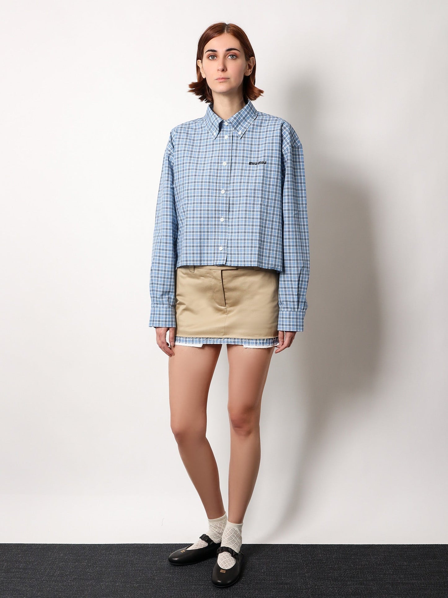 miu-miu-cotton-skirt-with-check-insert-on-the-bottom