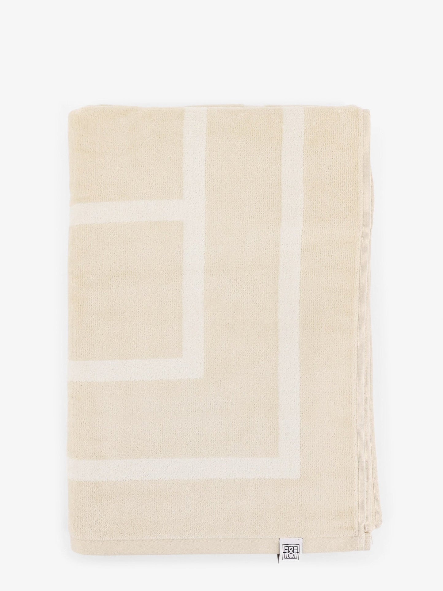 toteme-monogram-organic-cotton-beach-towel