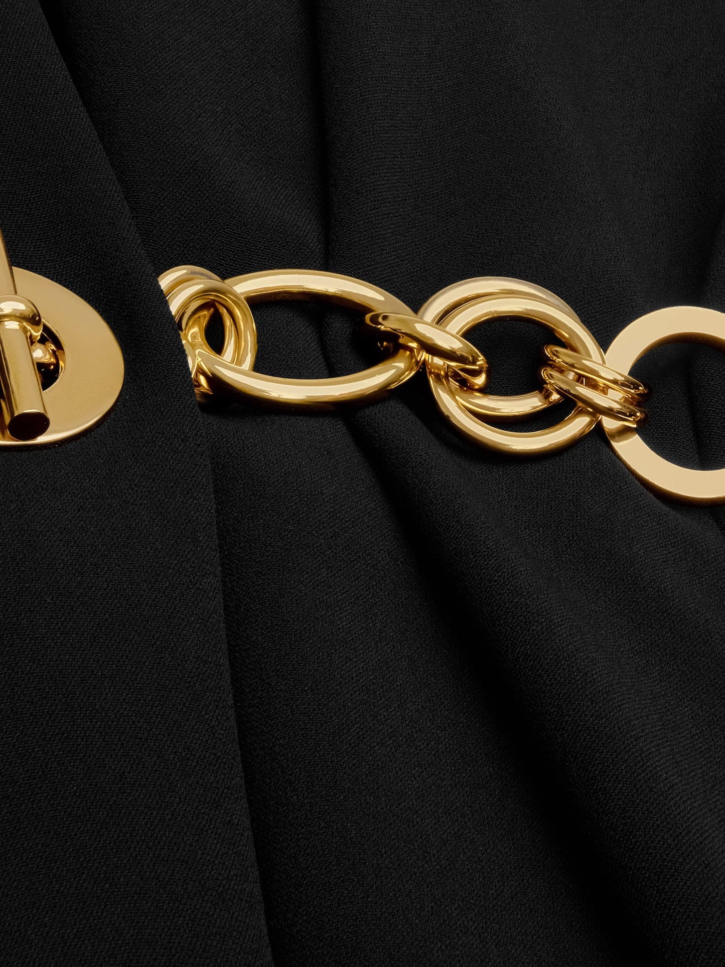 Wrap dress with gold metal charms