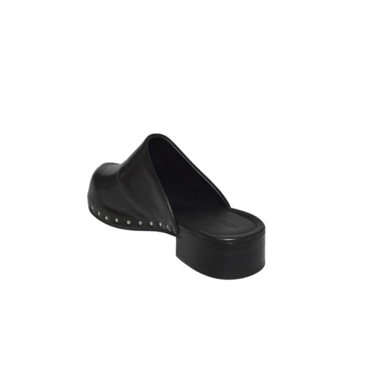 Black sandal with studded details on a white background