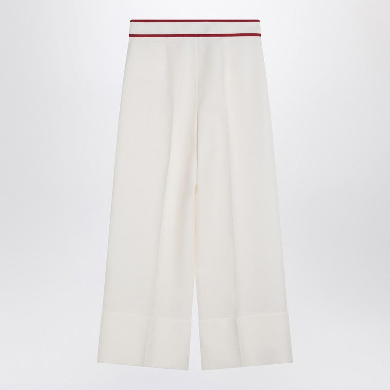 Ivory trousers with Gold V