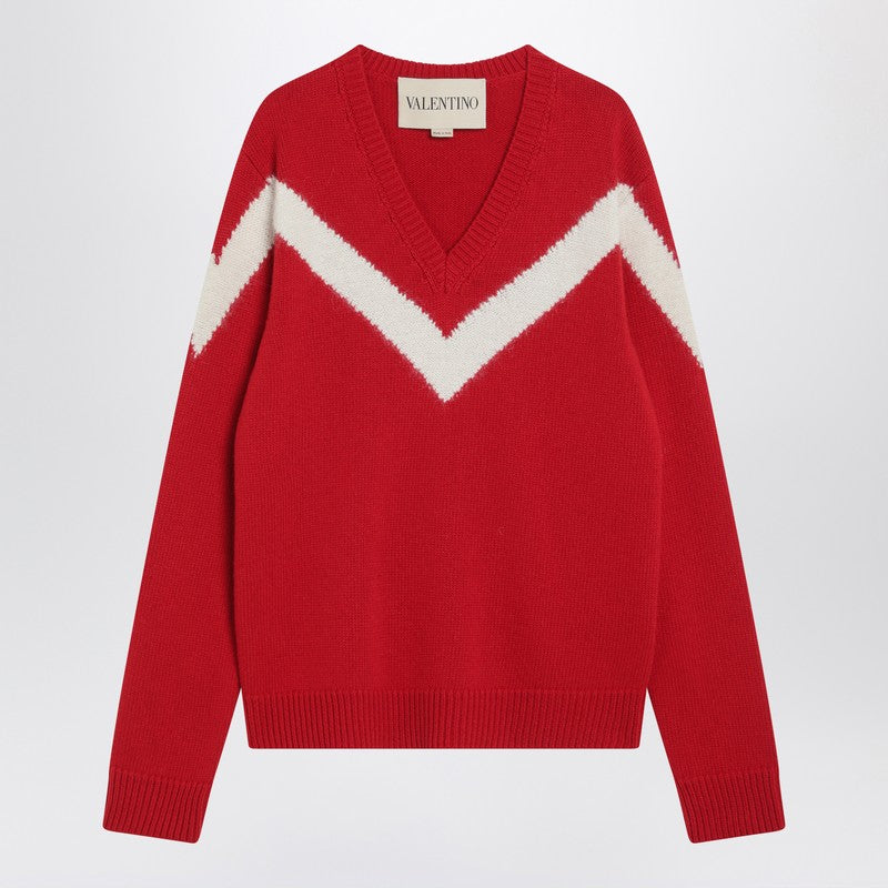 Red sweater with Vlogo on bow
