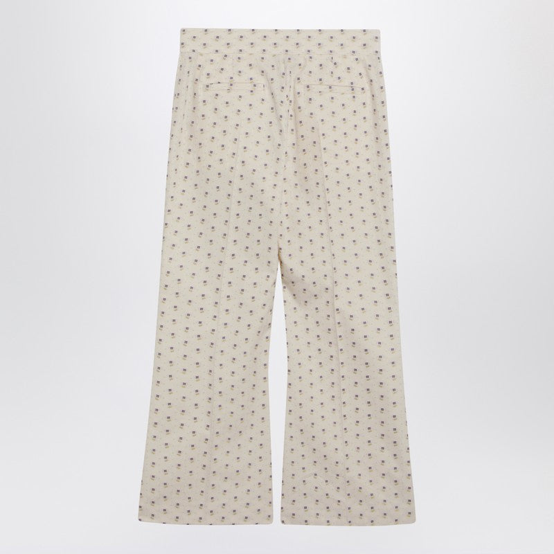 Ivory trousers with floral pattern