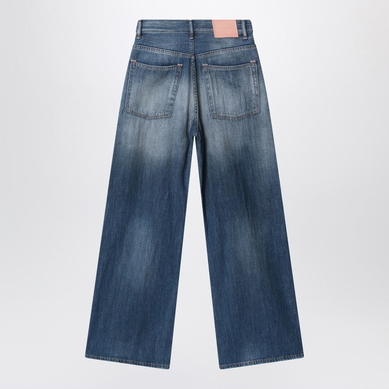 Blue jeans with a faded effect and splashes