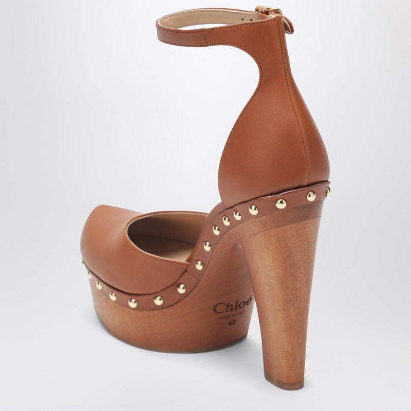 Brown platform pumps with studs