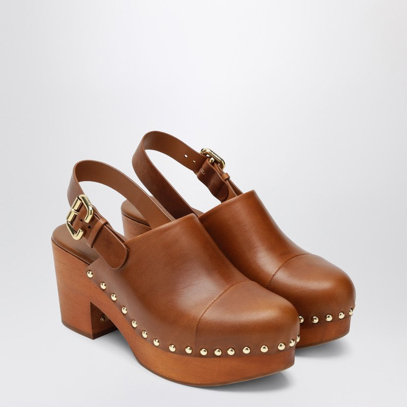 Brown Jeannette clogs with studs