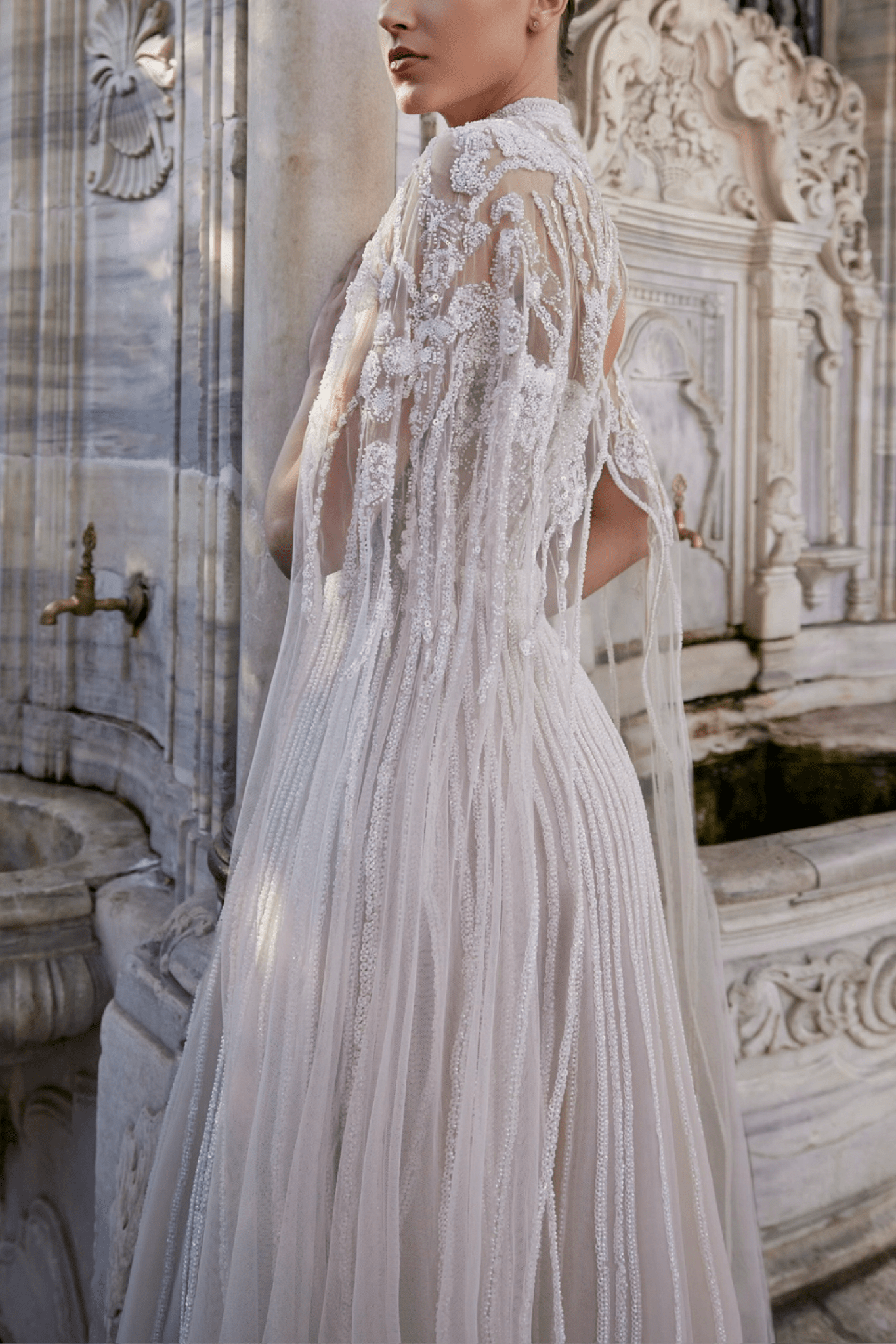 FULLY EMBROIDERED STRAPLESS TULLE DRESS WITH EMBROIDERED CAPE