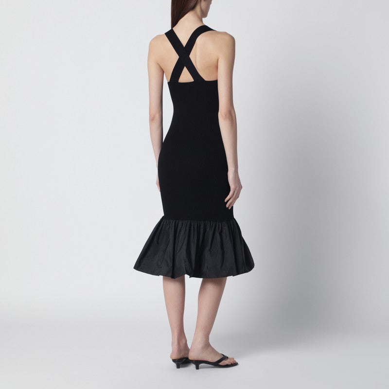 Black dress with faille ruffle hem