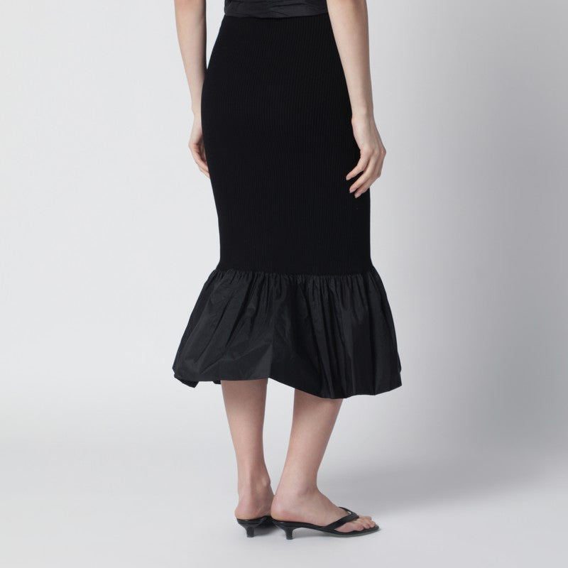 Black skirt with faille ruffle hem