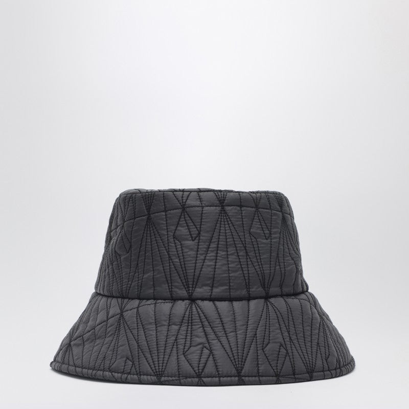 Black quilted hat with logo patch