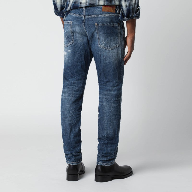 Slim blue washed jeans with rips