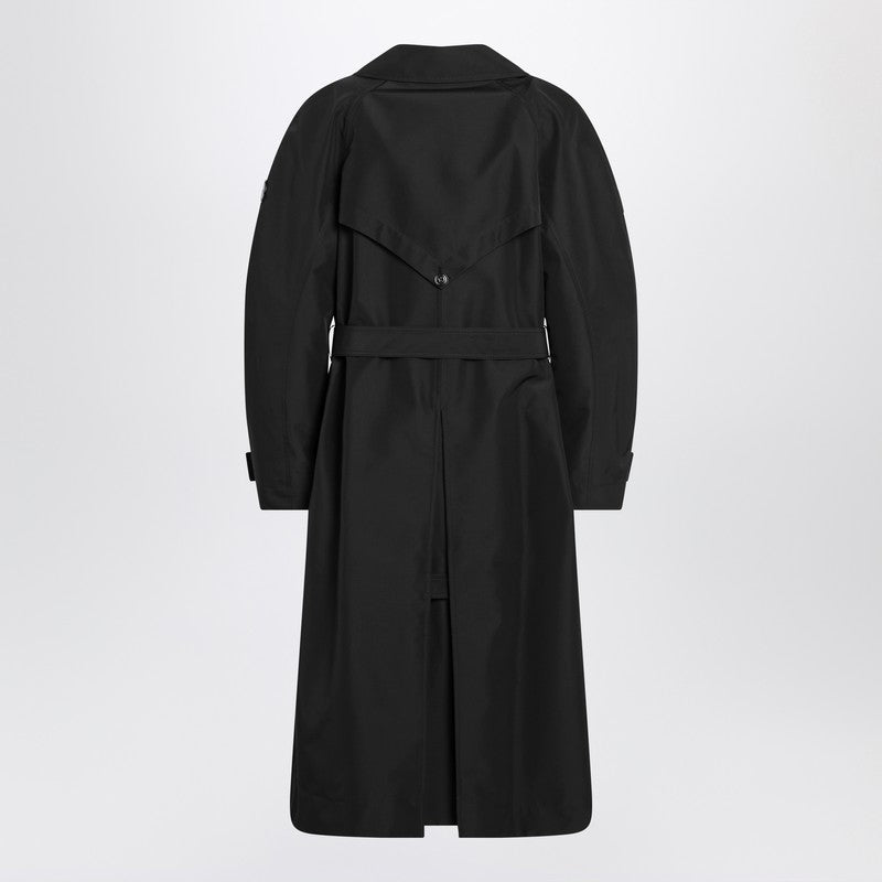 Black double-breasted trench coat with belt