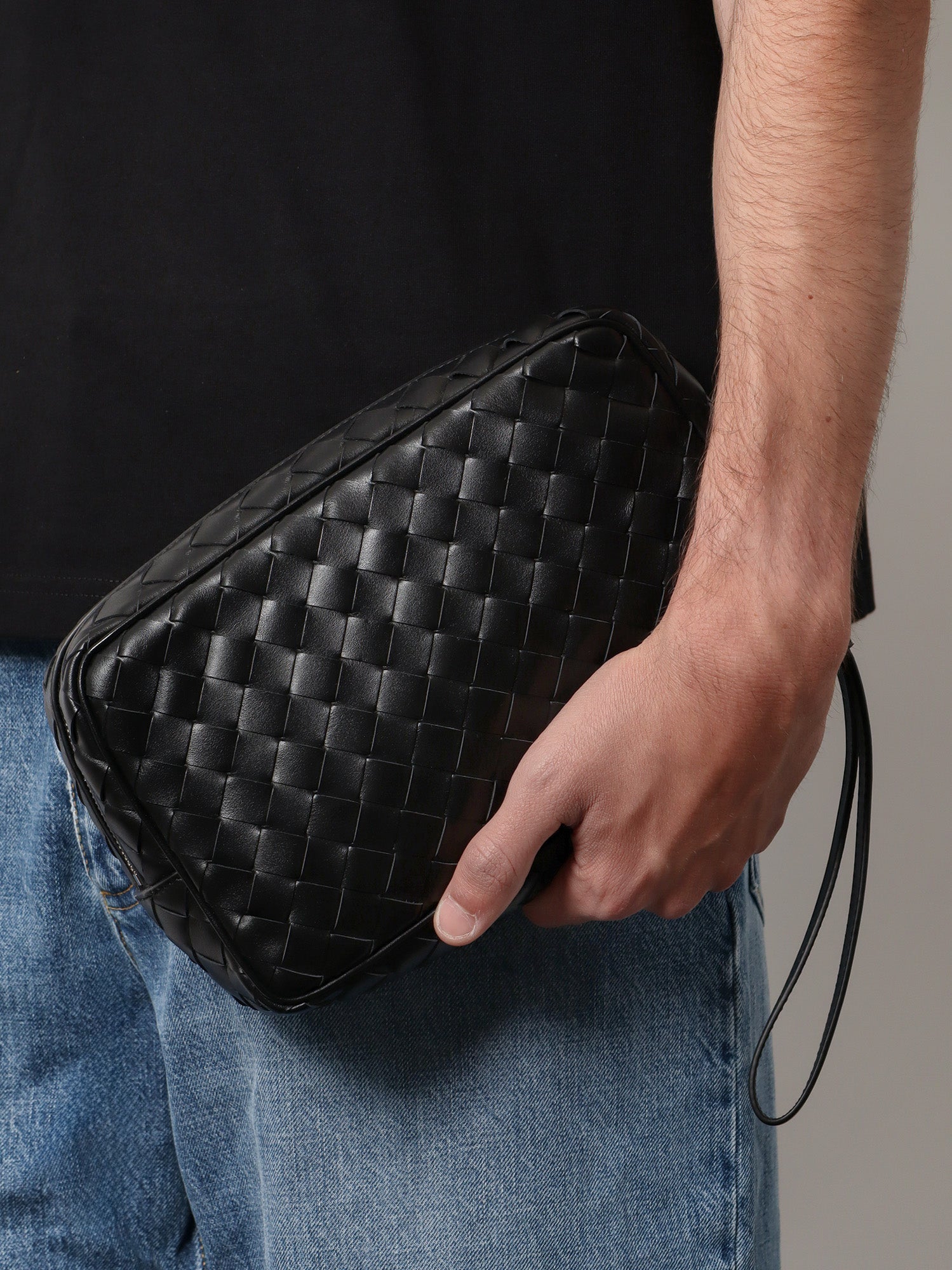 bottega-veneta-leather-clutch-with-woven-effect