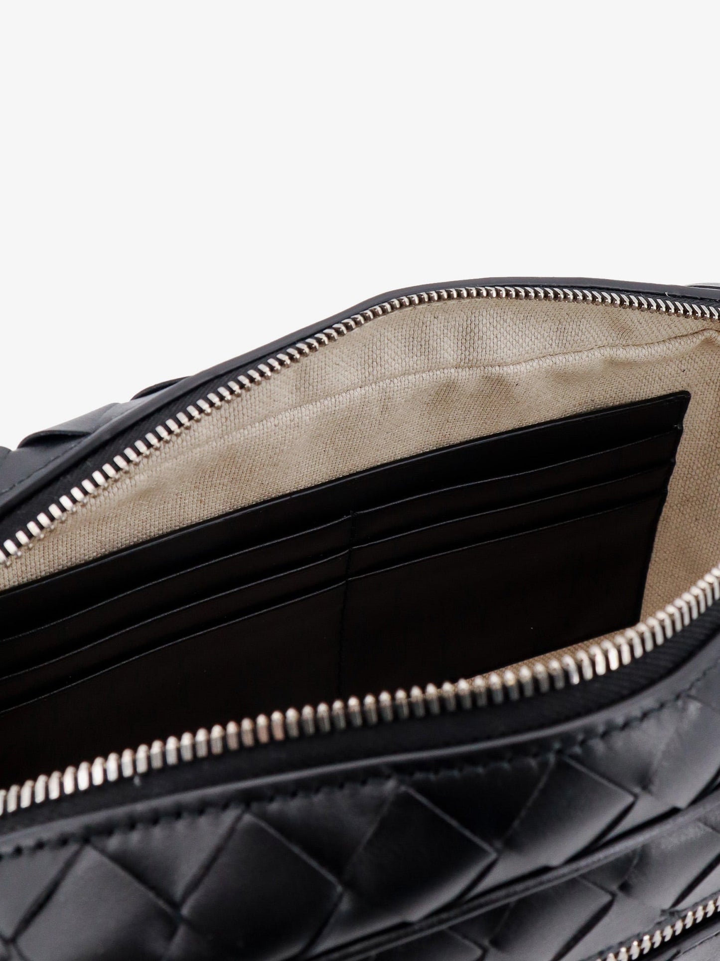 bottega-veneta-leather-clutch-with-woven-effect