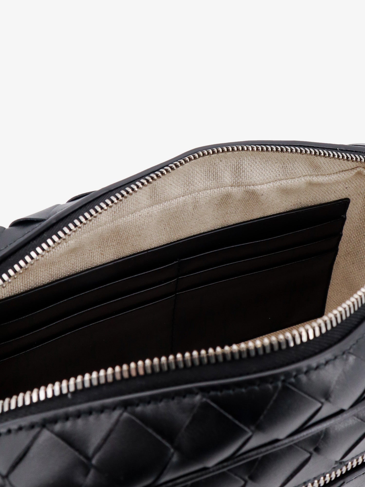 bottega-veneta-leather-clutch-with-woven-effect