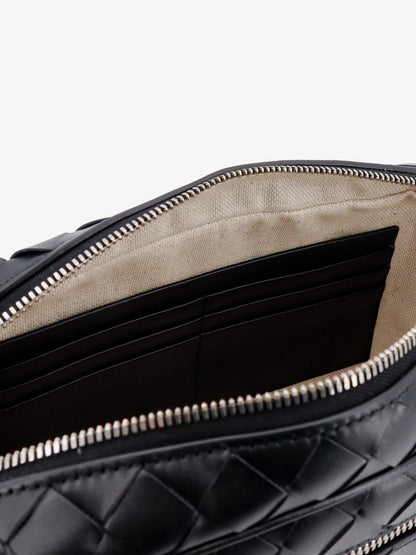 bottega-veneta-leather-clutch-with-woven-effect