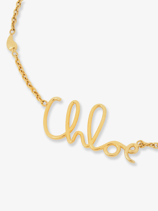 chloe'-brass-necklace-with-lettering-logo