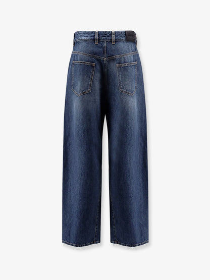 givenchy-twisted-re-washed-denim-jeans