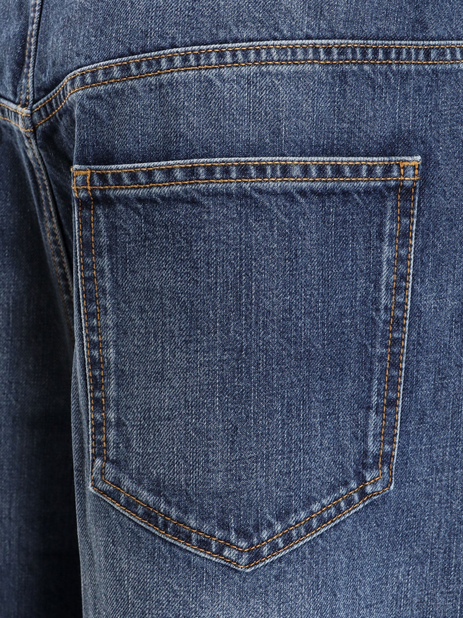 givenchy-twisted-re-washed-denim-jeans