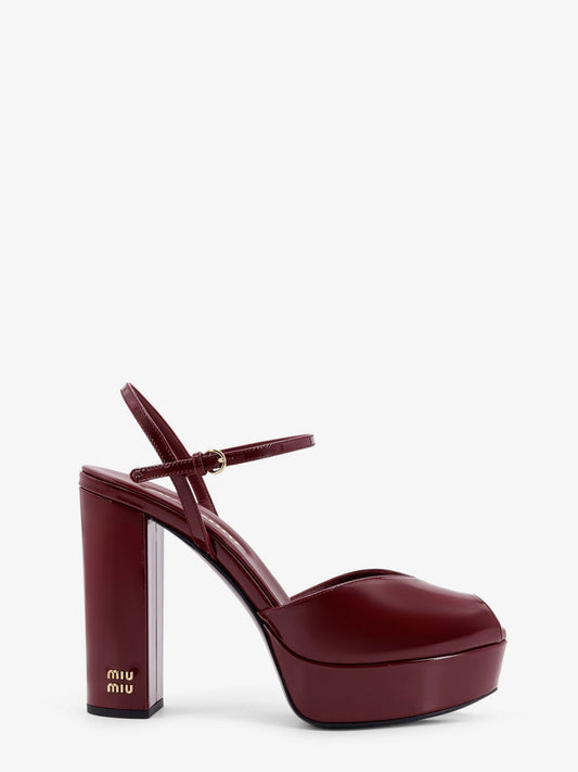 miu-miu-patent-leather-sandals-with-heel-and-wedge