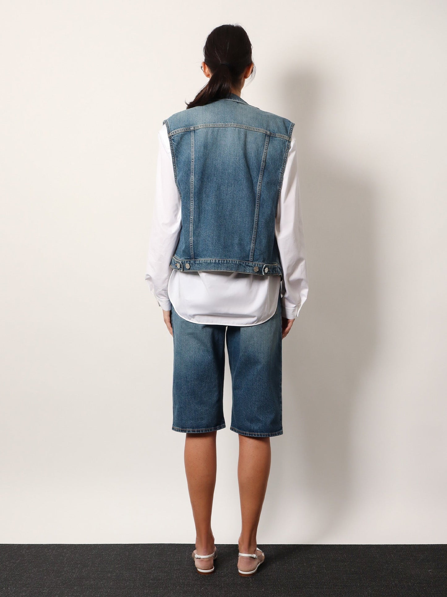 alaia-stone-washed-denim-sleeveless-jacket