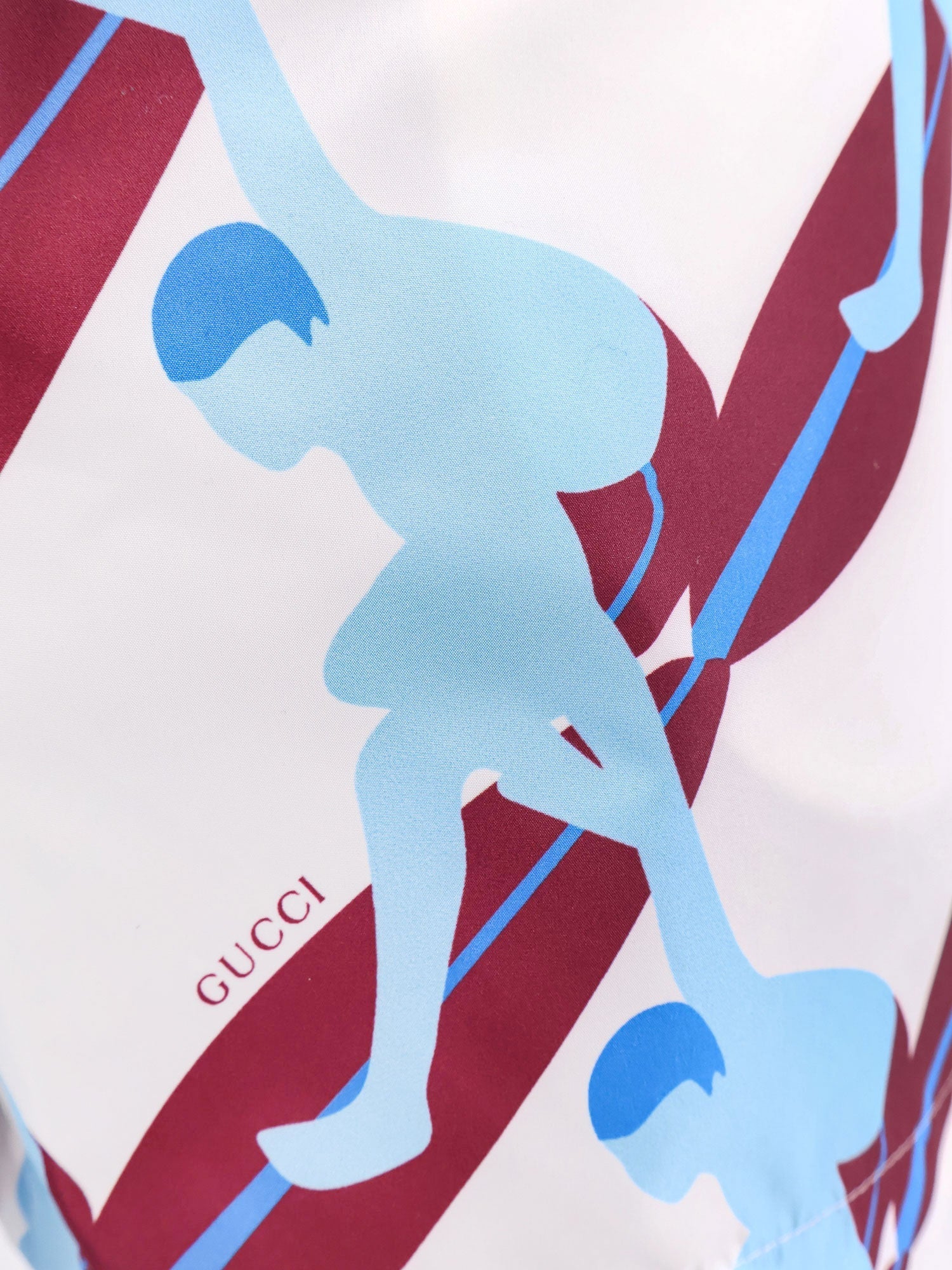 gucci-nylon-swim-trunk-with-surfer-print