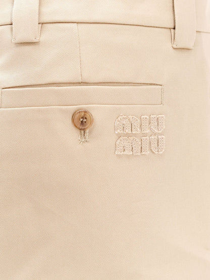 miu-miu-cotton-skirt-with-check-insert-on-the-bottom