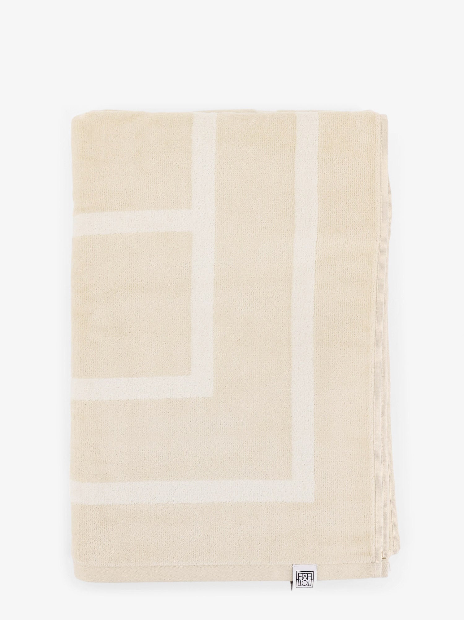 toteme-monogram-organic-cotton-beach-towel