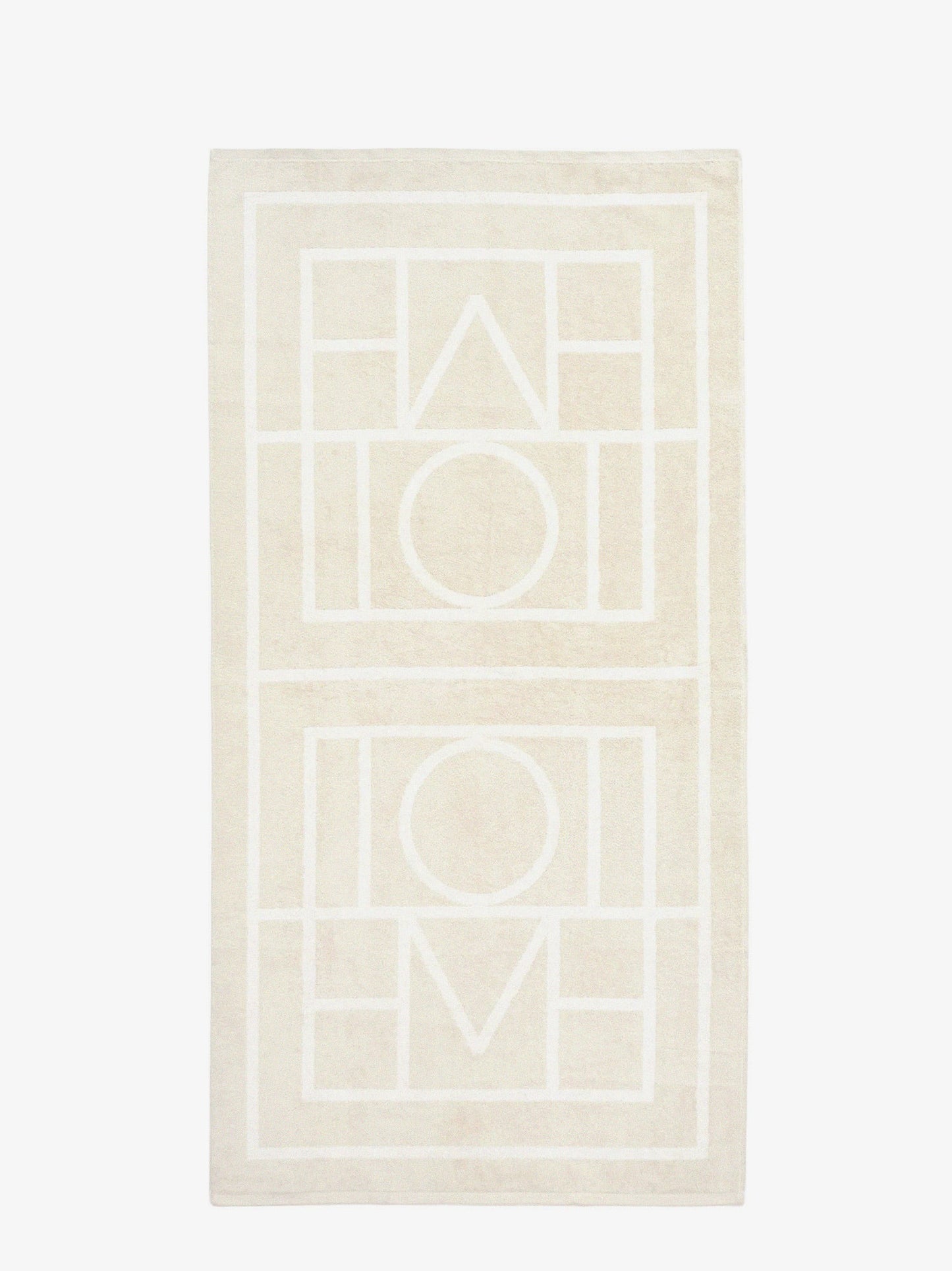 toteme-monogram-organic-cotton-beach-towel