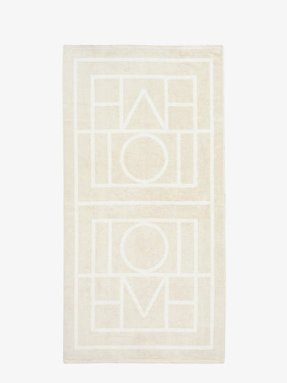 toteme-monogram-organic-cotton-beach-towel