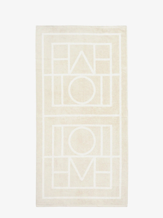 toteme-monogram-organic-cotton-beach-towel