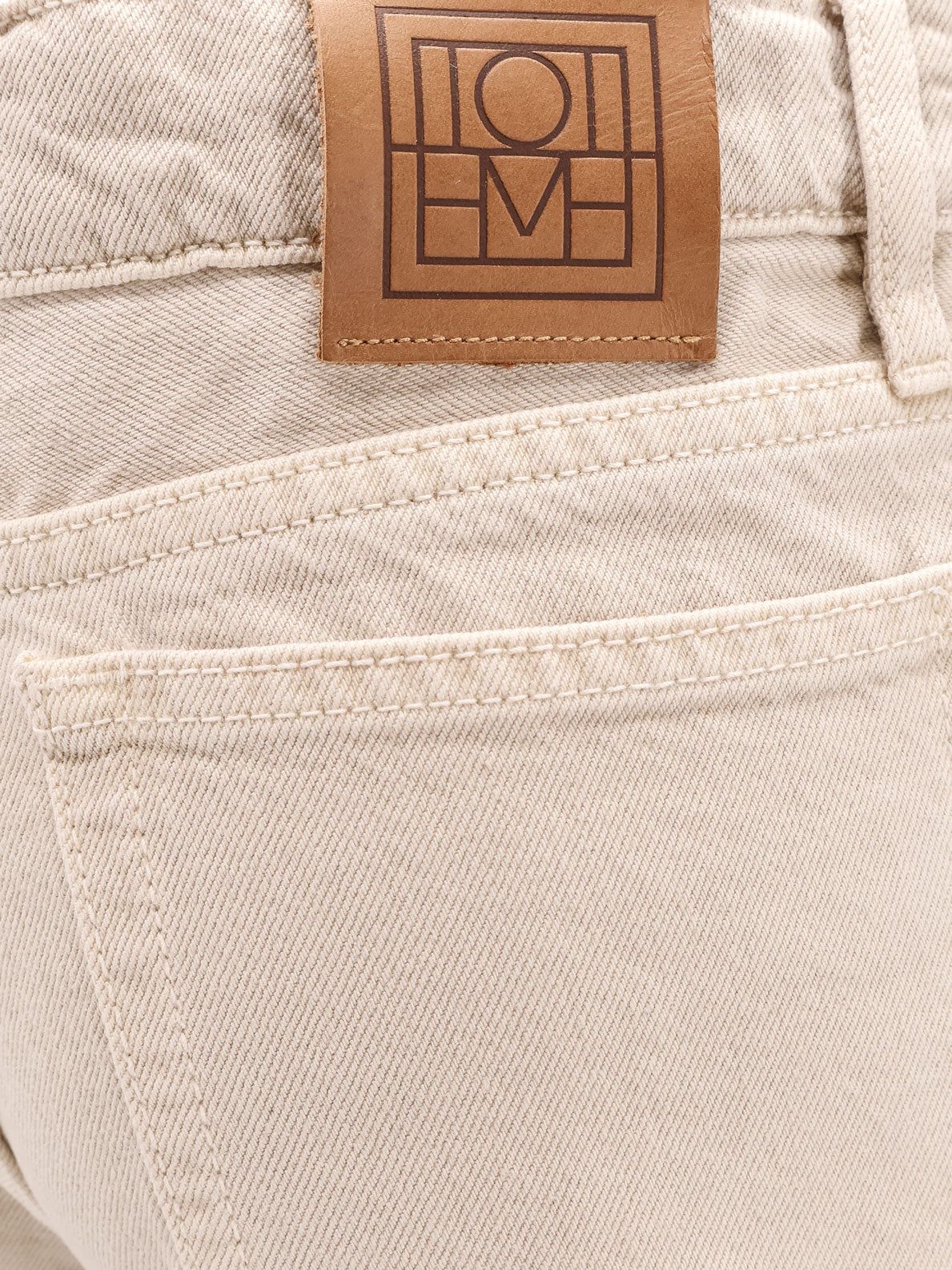 toteme-low-taper-denim-trouser