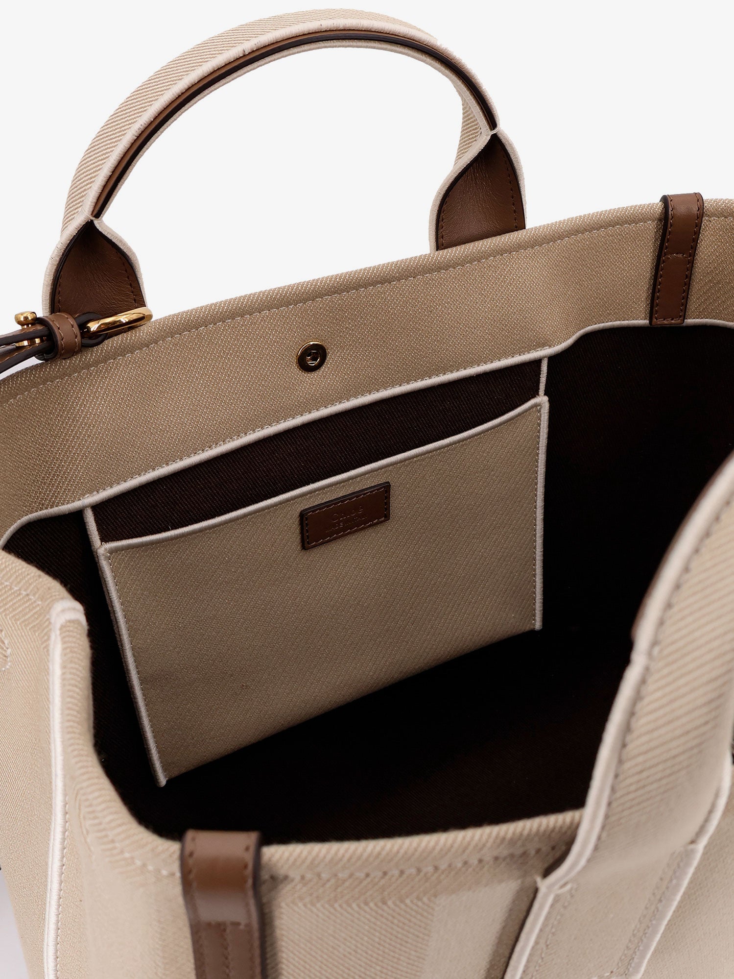 Striped jacquard fabricChloé Carry crossbody bag with oversized logo on the front