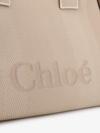 Striped jacquard fabricChloé Carry crossbody bag with oversized logo on the front