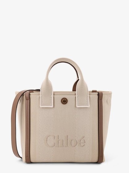 Chloé Carry canvas crossbody bag with oversized logo on the front