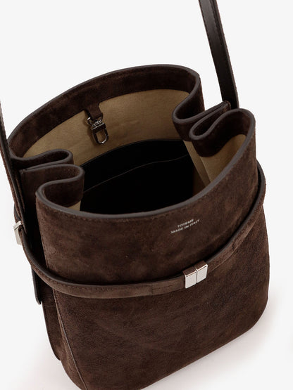 Suede shoulder bag with metal detail on the front