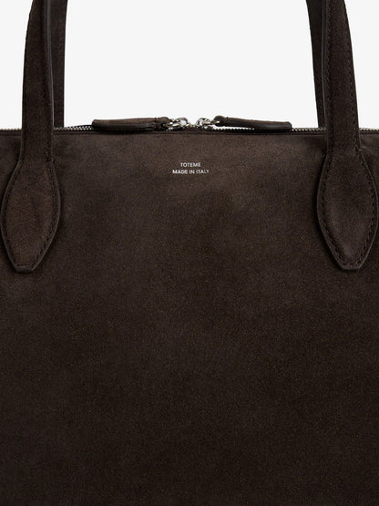 Suede shoulder bag with logo lettering on the front