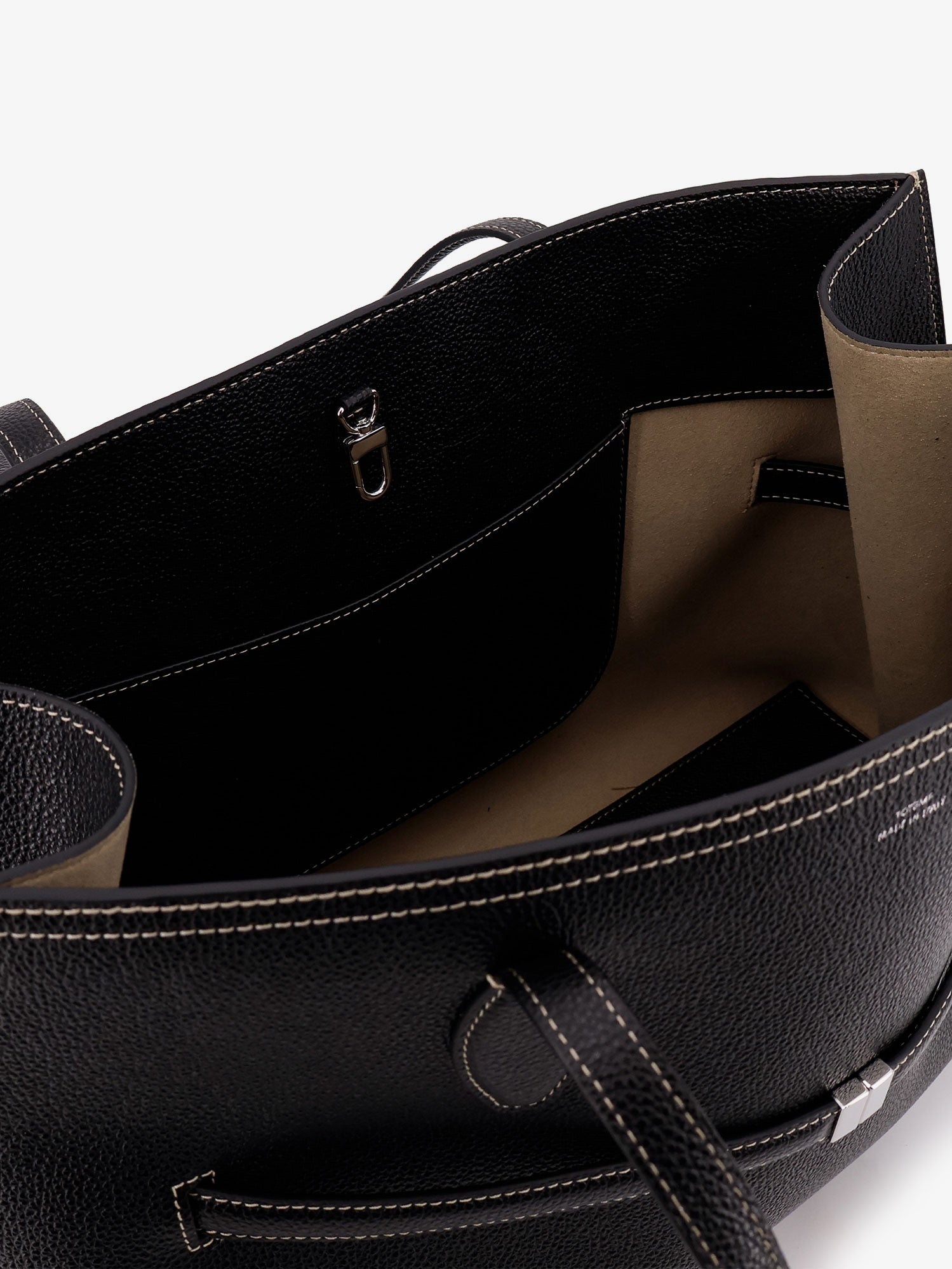 Leather shoulder bag with lettering logo on the front