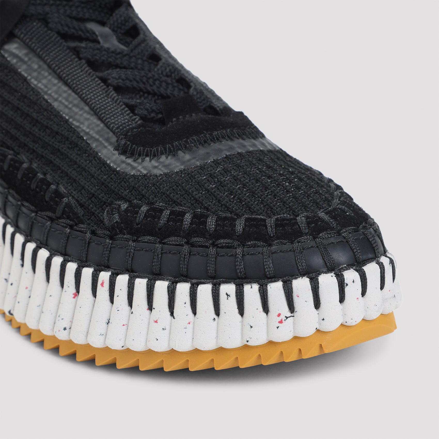 Black Nama sneakers in lower-impact mesh