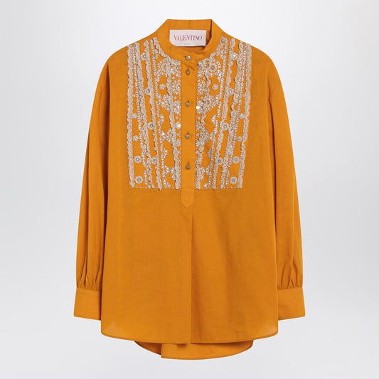 Ochre yellow shirt with beads and lace