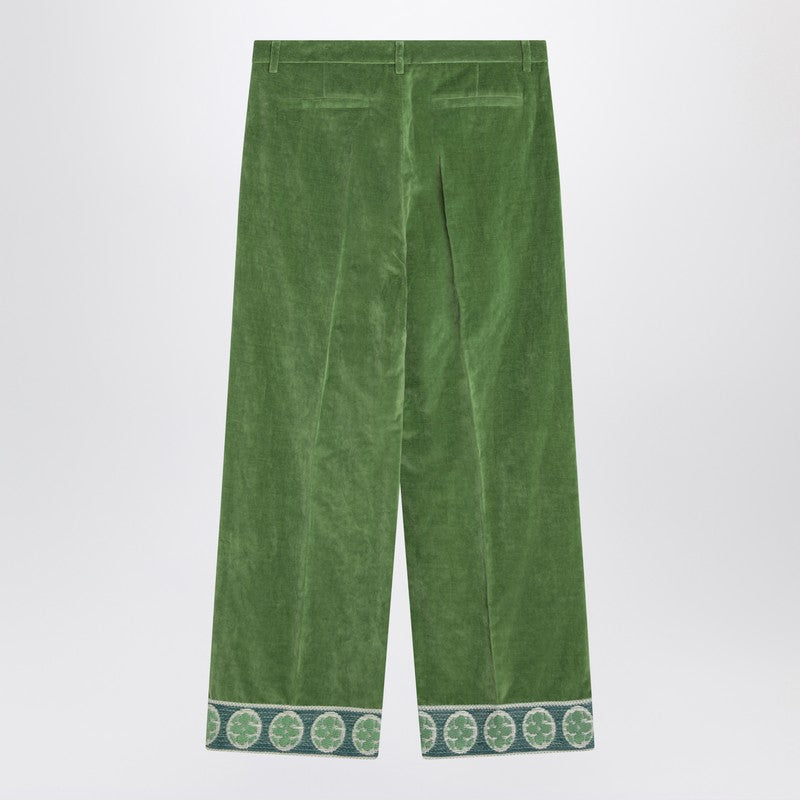 Green velvet trousers with jacquard hem