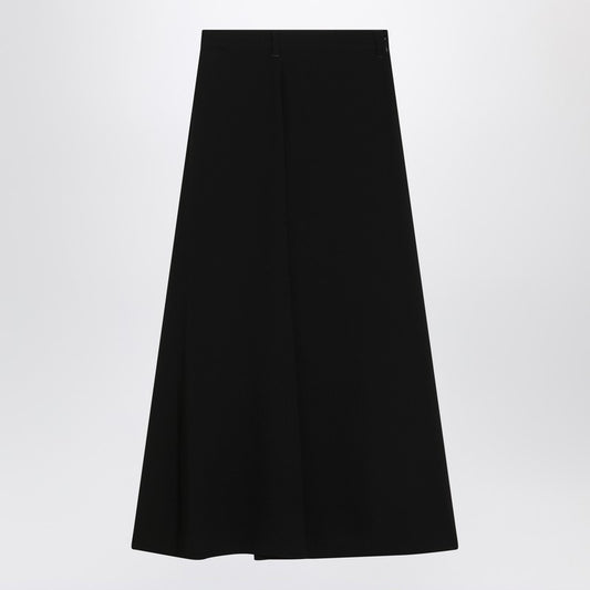 Draped black skirt in crêpe